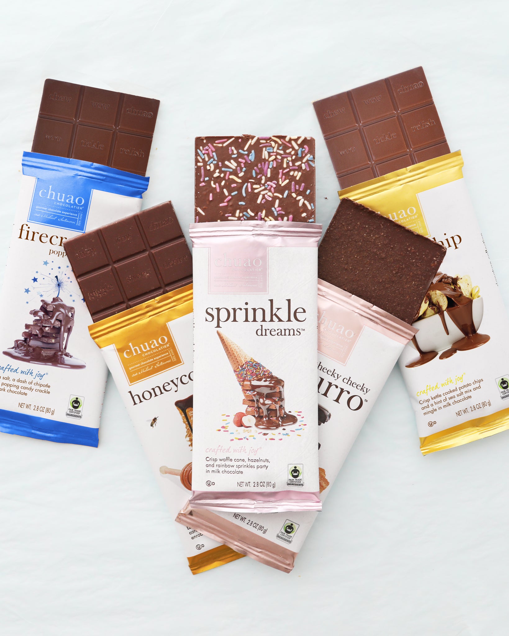 Assorted chocolate bars and packaging on a white background