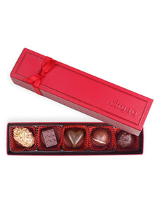 5 assorted bonbons in a rectangular red box with a red bow