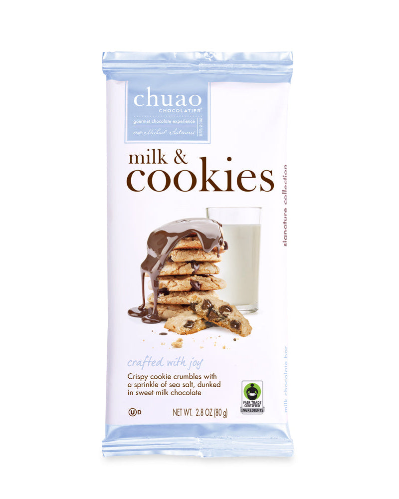 Packaging of chuao milk & cookies with a glass of milk on a white background