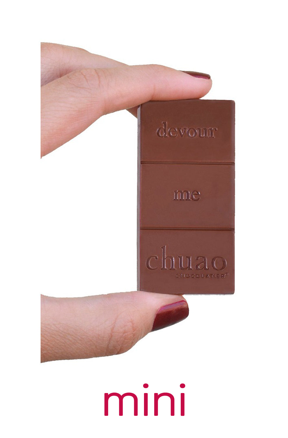 an unwrapped bar of chuao's milk chocolate in a mini bar format