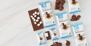 Oh My S'mores chocolate bars and bark luxe with marshmallows on a white surface