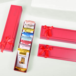 4 taste the joy gift sets, on graphic monotone background. shop gift sets.
