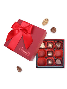 9 pieces of milk chocolate bonbons and truffles in a red gift box